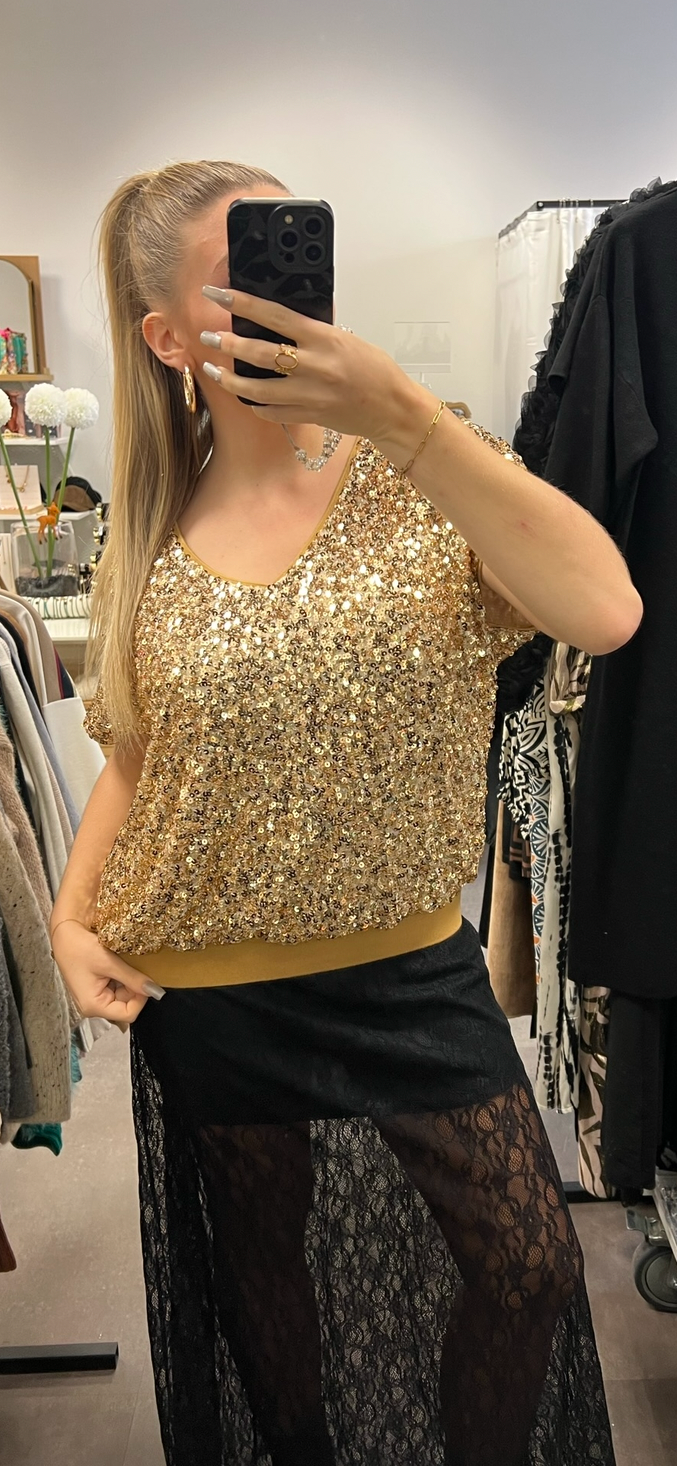 haut à sequins dorés