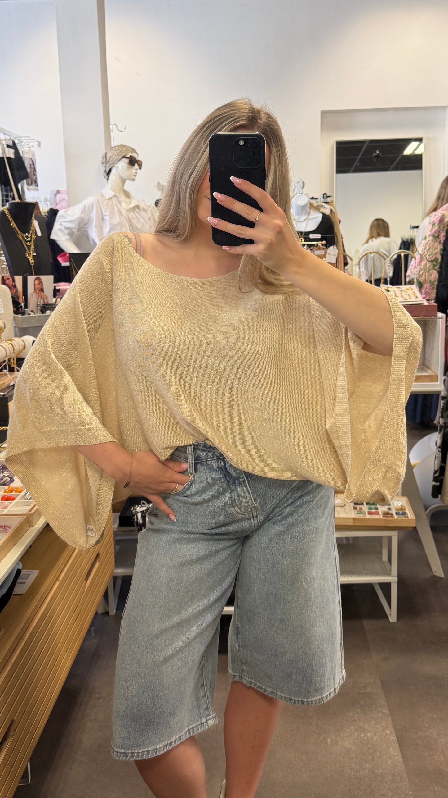 haut cape brillant